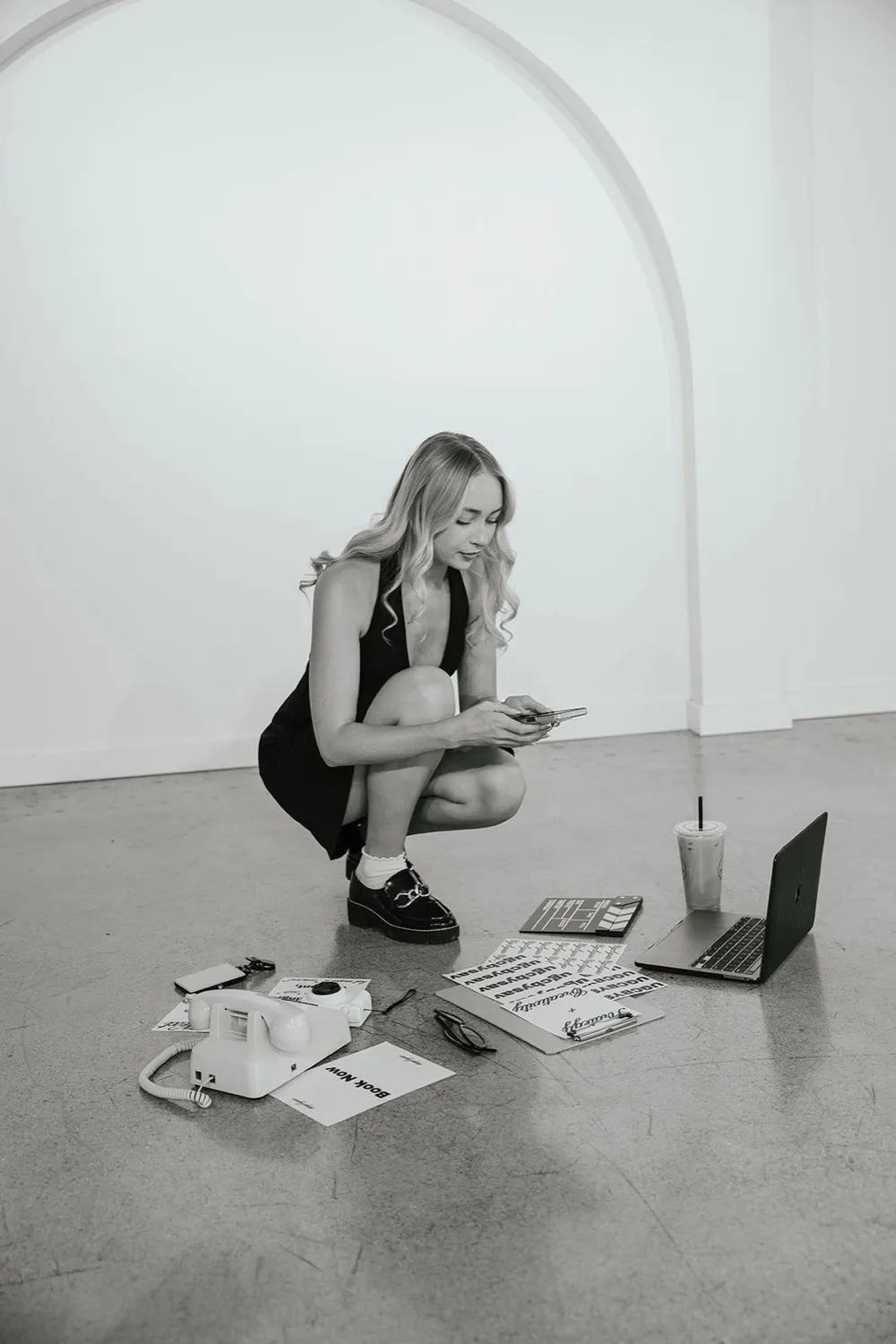 Savannah June reviewing content at work